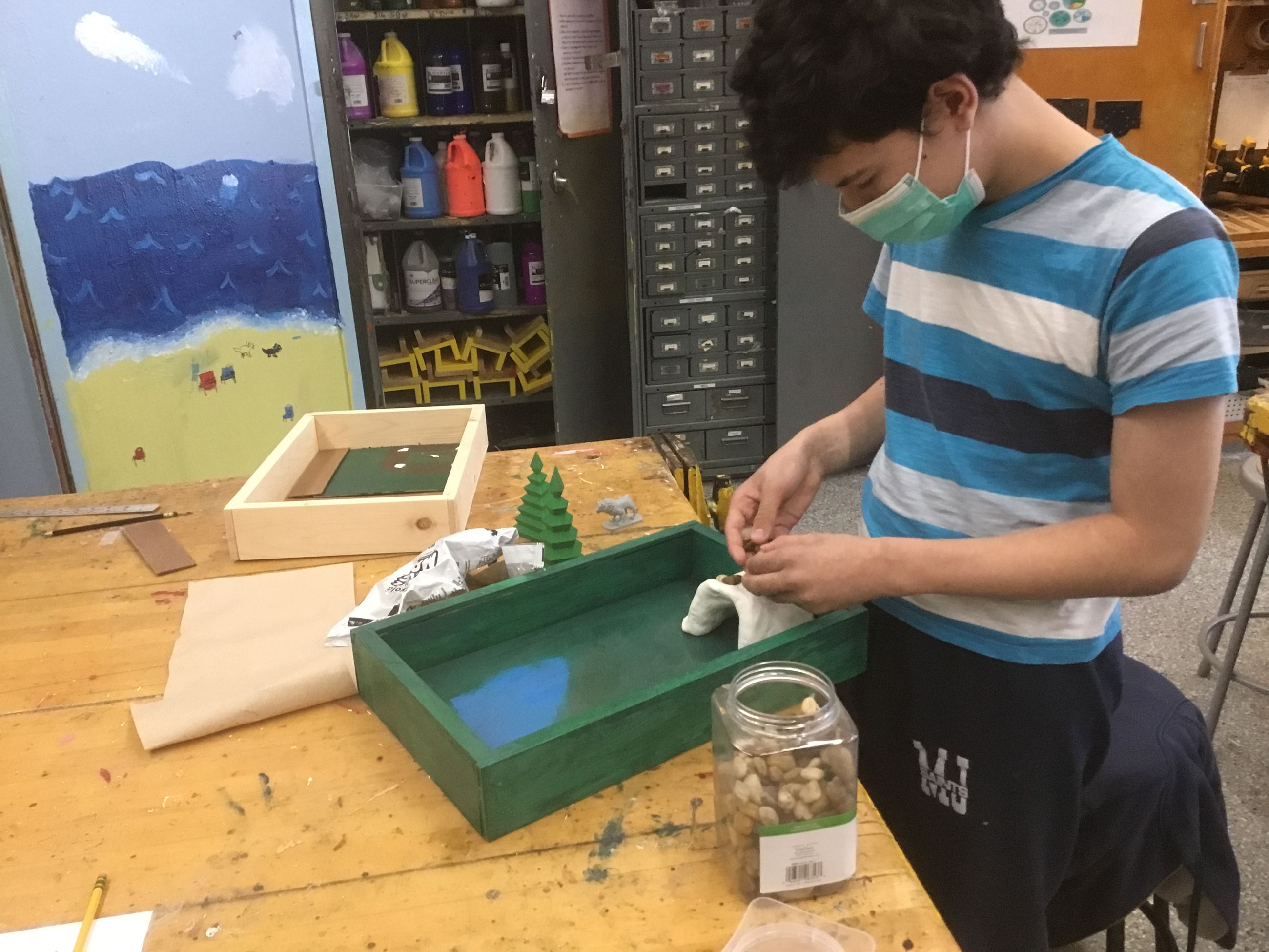Student Nigel Correra creates a play box for K Students