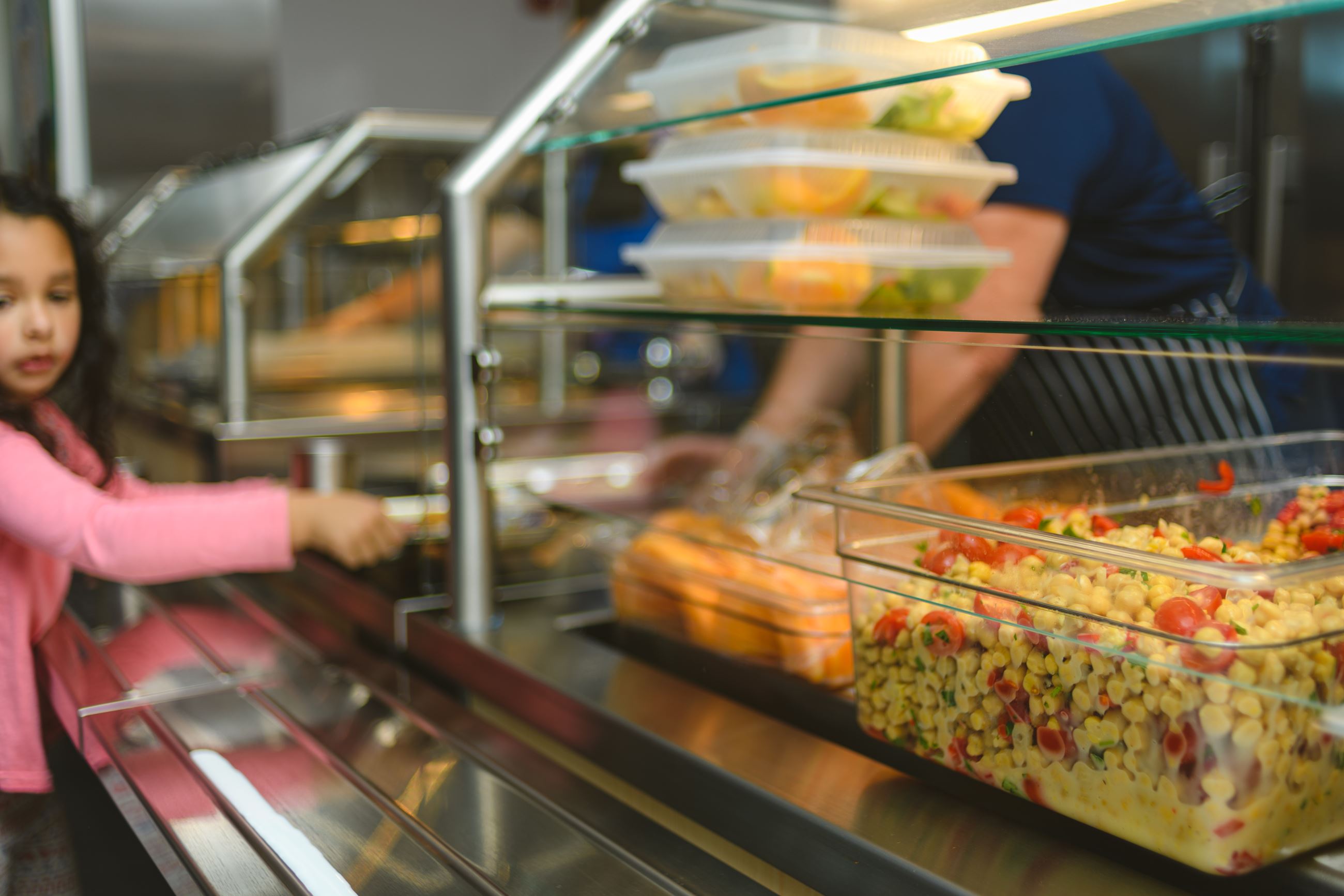 Child in cafeteria line at MES