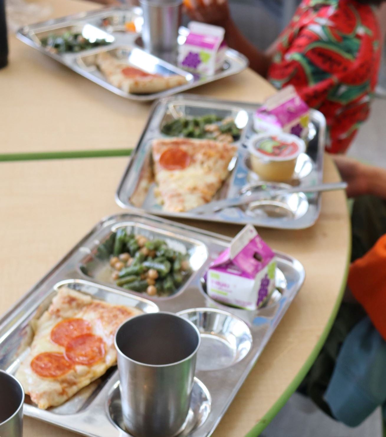 Boys eating in cafeteria